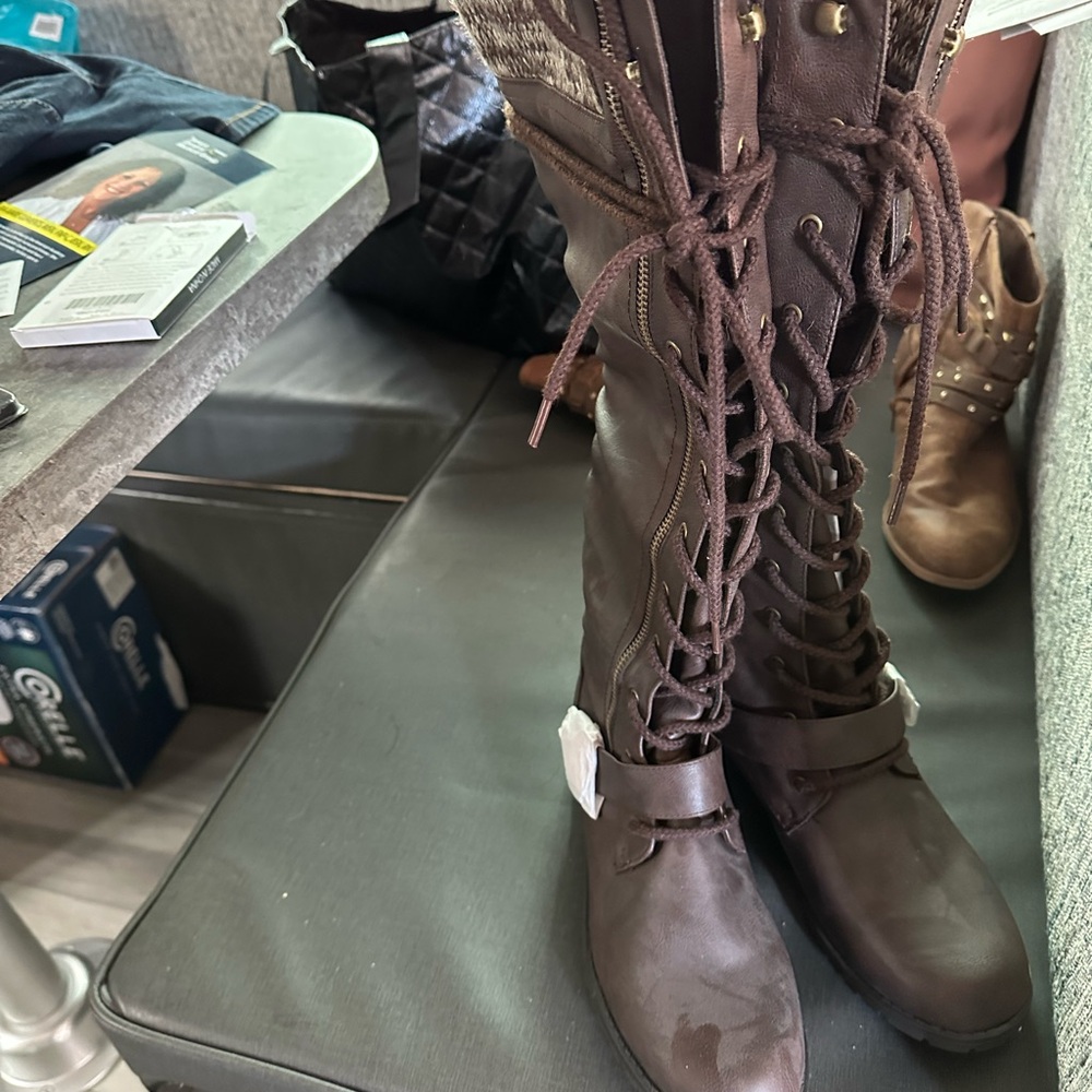 Size 9 lace up/zip up knee hi boots.  Brand new w/o tags